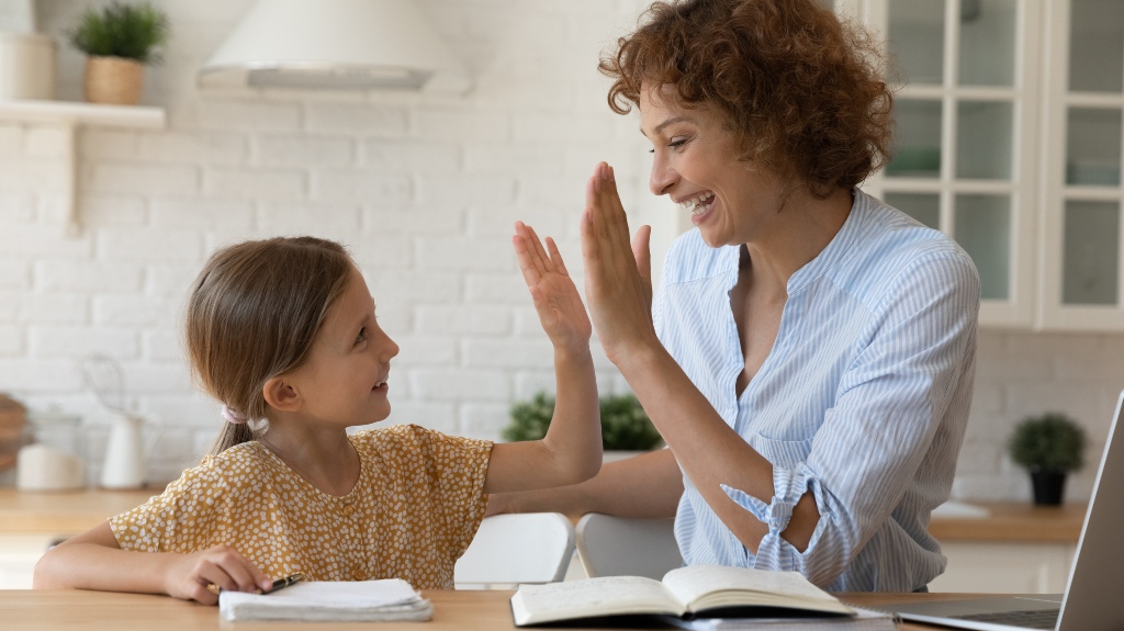 Excited mother give high five
